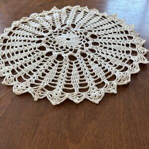 Beige crocheted doily